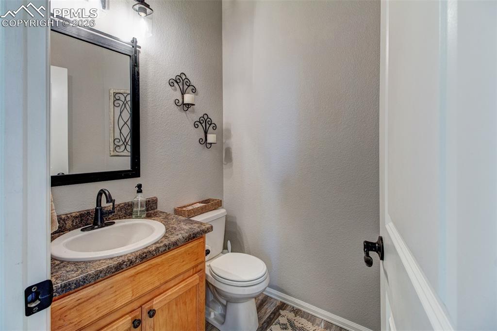 Image 14 of 32: Main level powder room