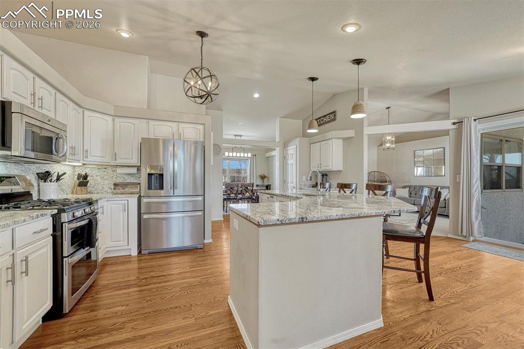 Image 3 of 42: The kitchen in this home is bright, spacious and beautifully appointed