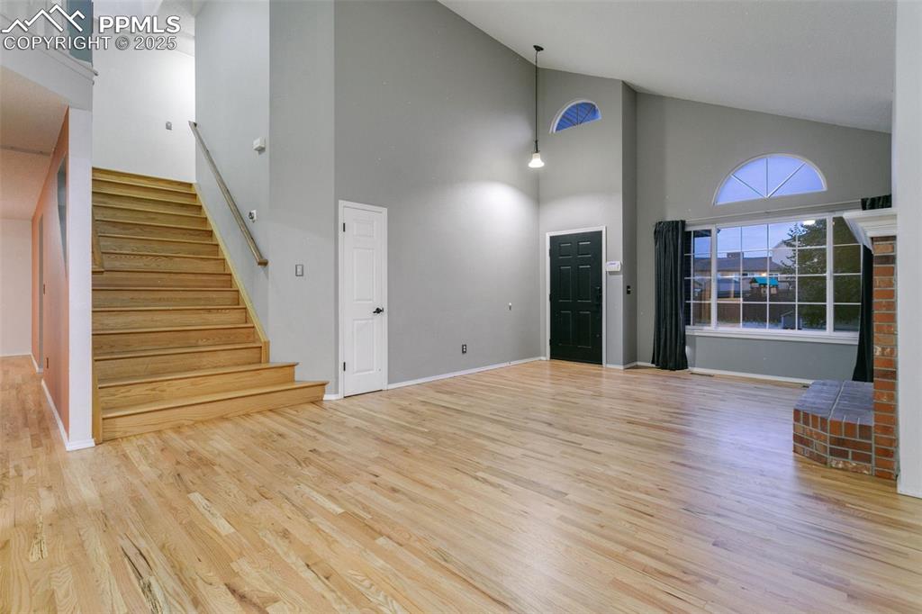 Image 11 of 50: Living room and entry