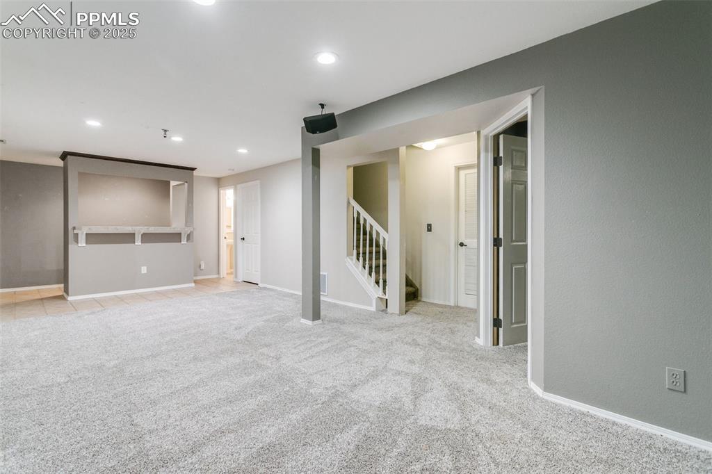 Image 39 of 50: Family room in basement