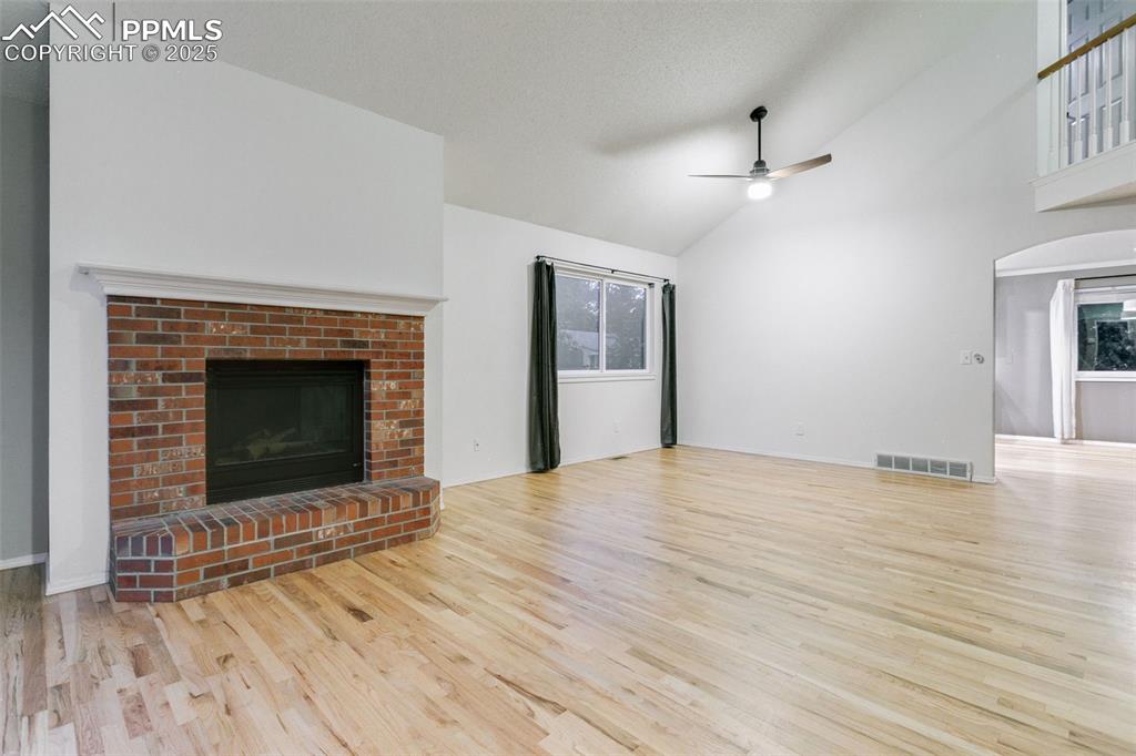 Image 7 of 50: Living room with fireplace
