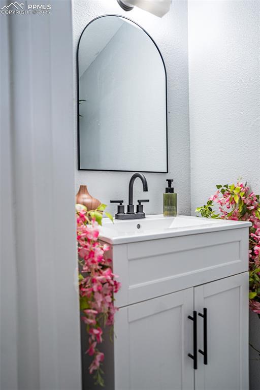 Image 8 of 18: Main level bath