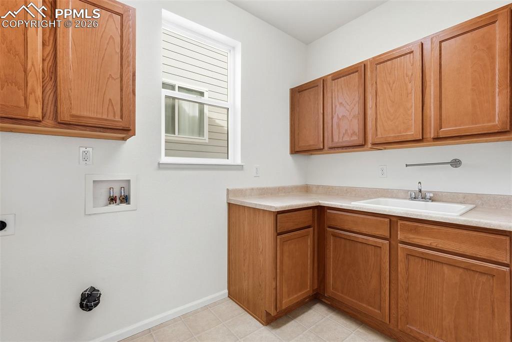 Image 25 of 50: Main level laundry