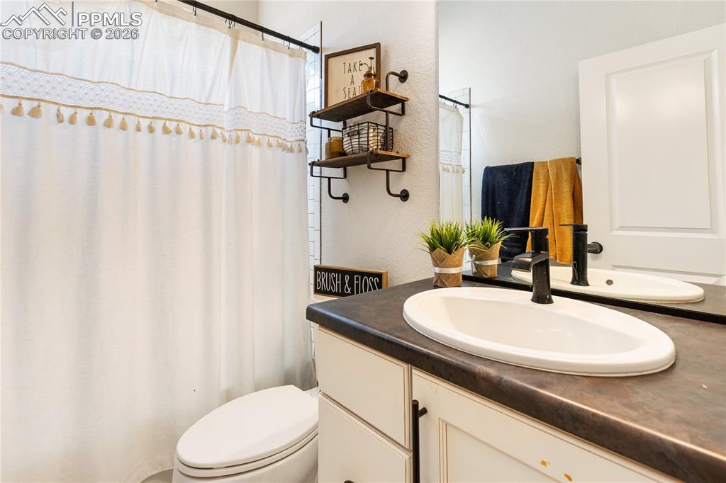 Image 23 of 47: Hall bath