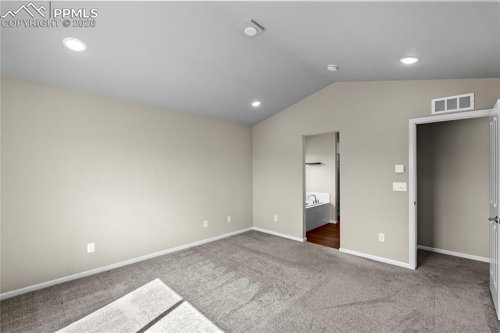 Image 14 of 43: Unfurnished bedroom featuring carpet floors and recessed lighting