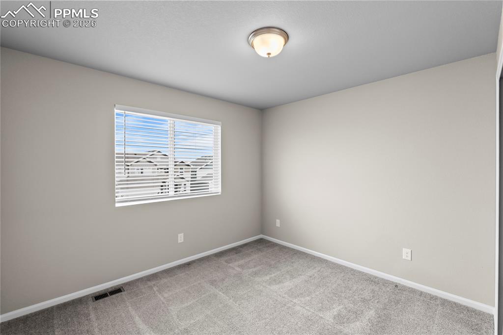 Image 19 of 43: Upper Level Bedroom