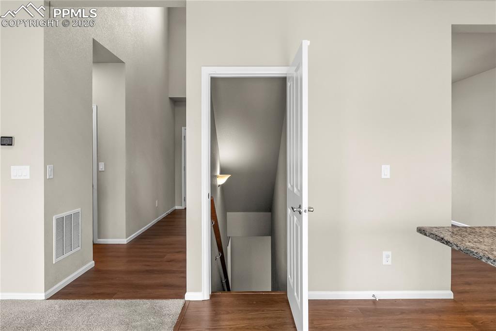 Image 27 of 43: Stairs leading to finished basement