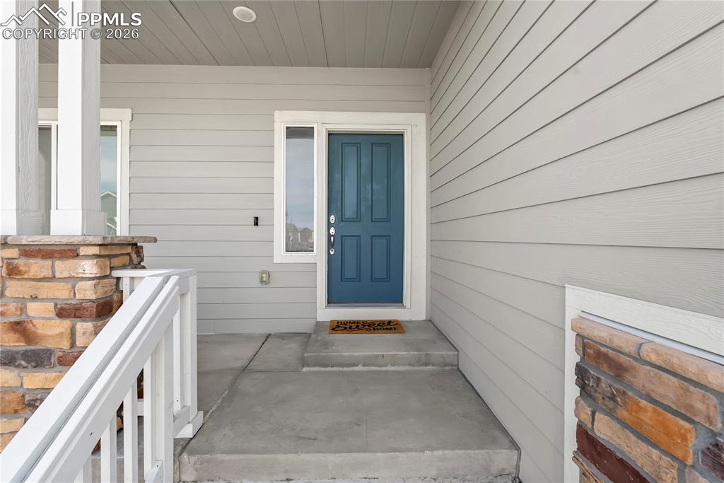 Image 3 of 43: View of exterior entry with a porch