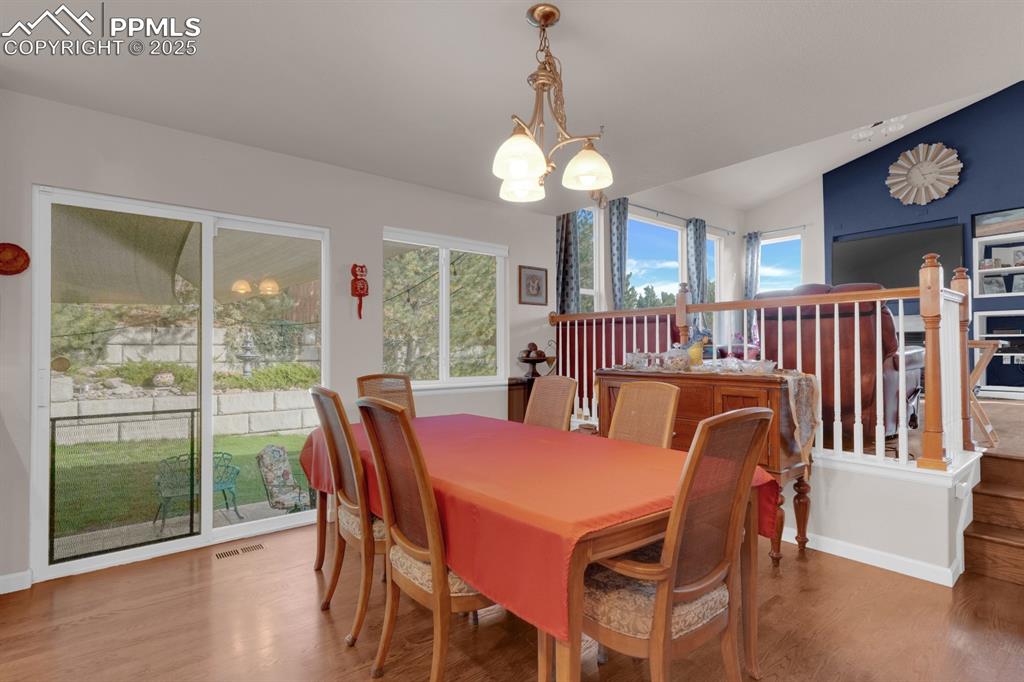 Image 13 of 43: Dining Area flows to Living Room