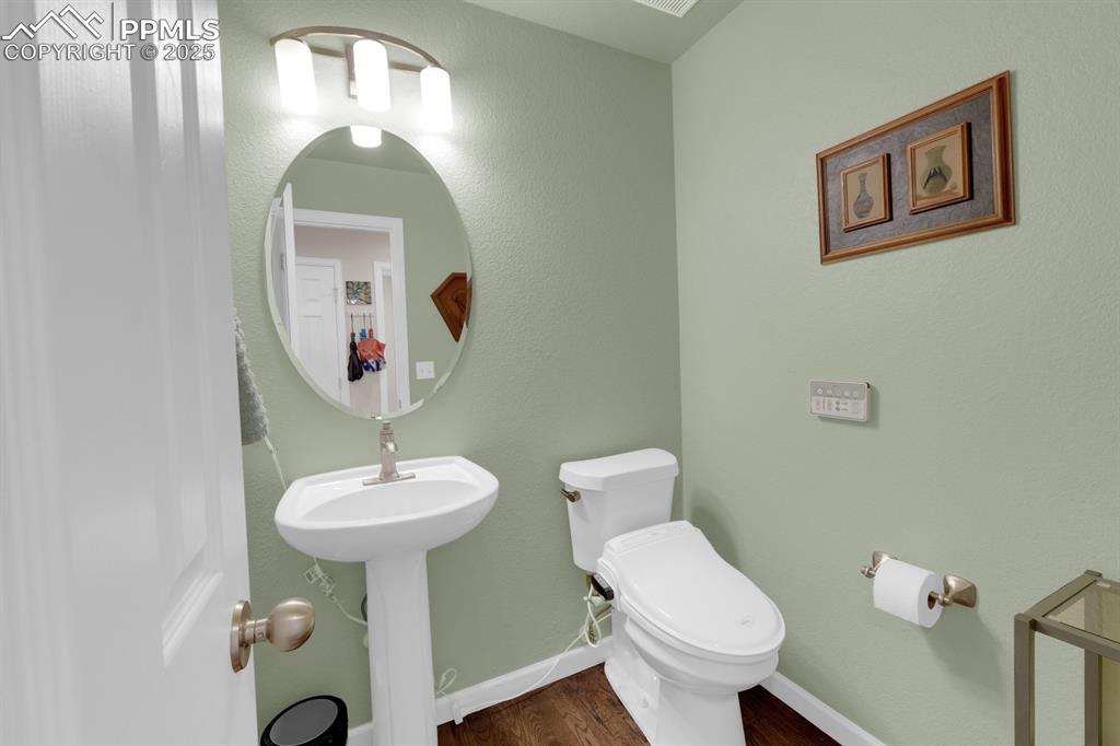 Image 15 of 43: Main Level Bathroom with Bidet