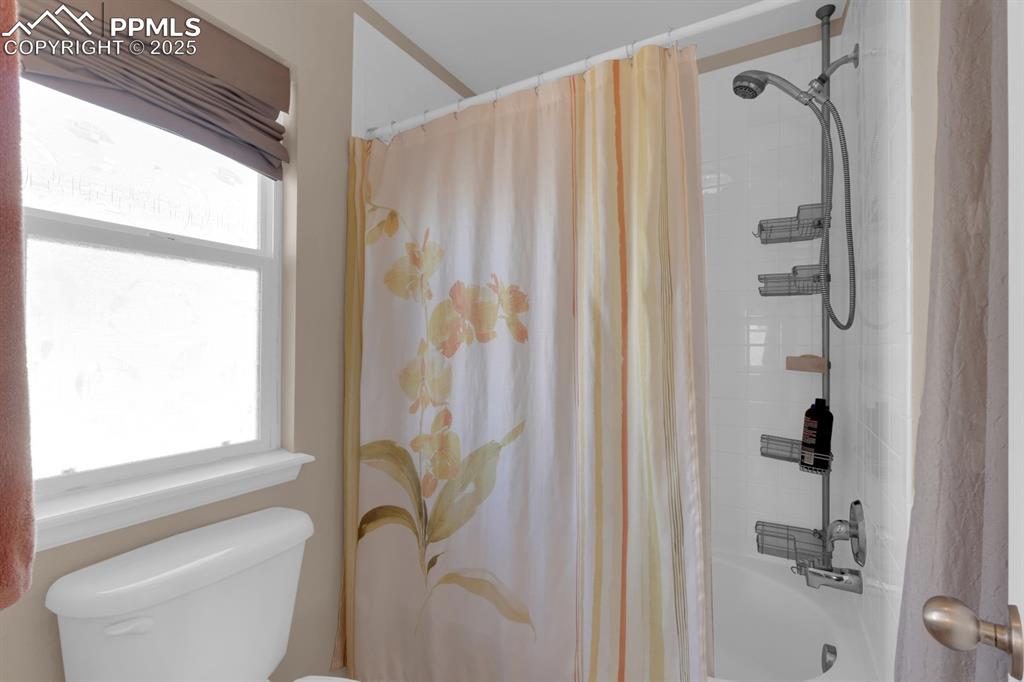 Image 20 of 43: Full bathroom with shower/soaking tub combo