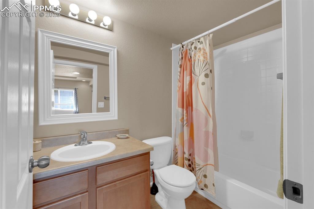 Image 30 of 43: Full Basement Bathroom