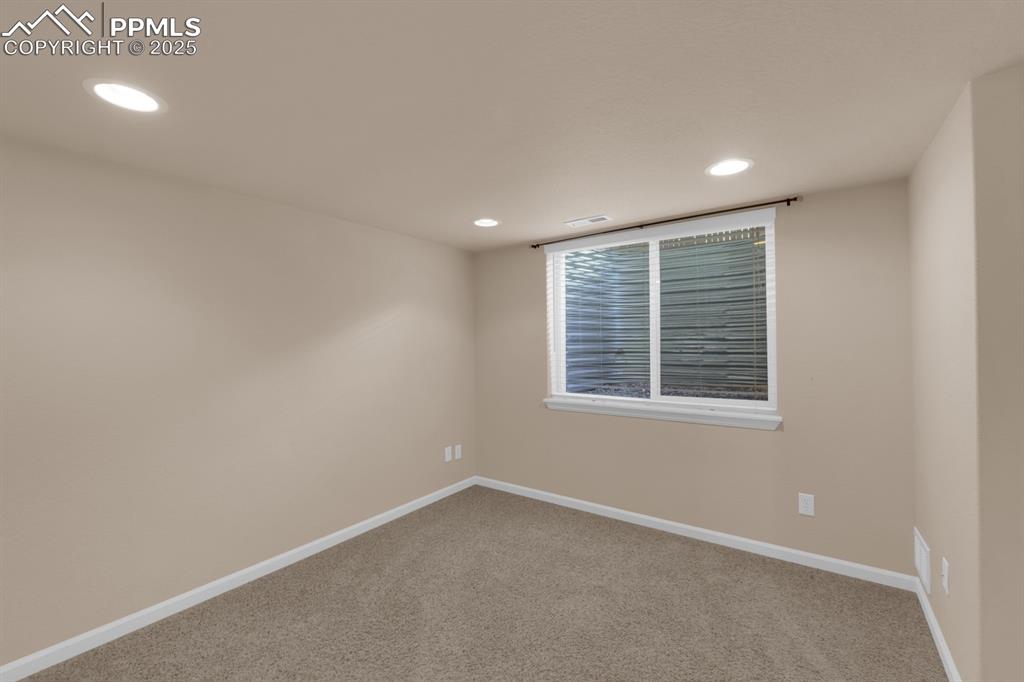 Image 31 of 43: Basement Bedroom
