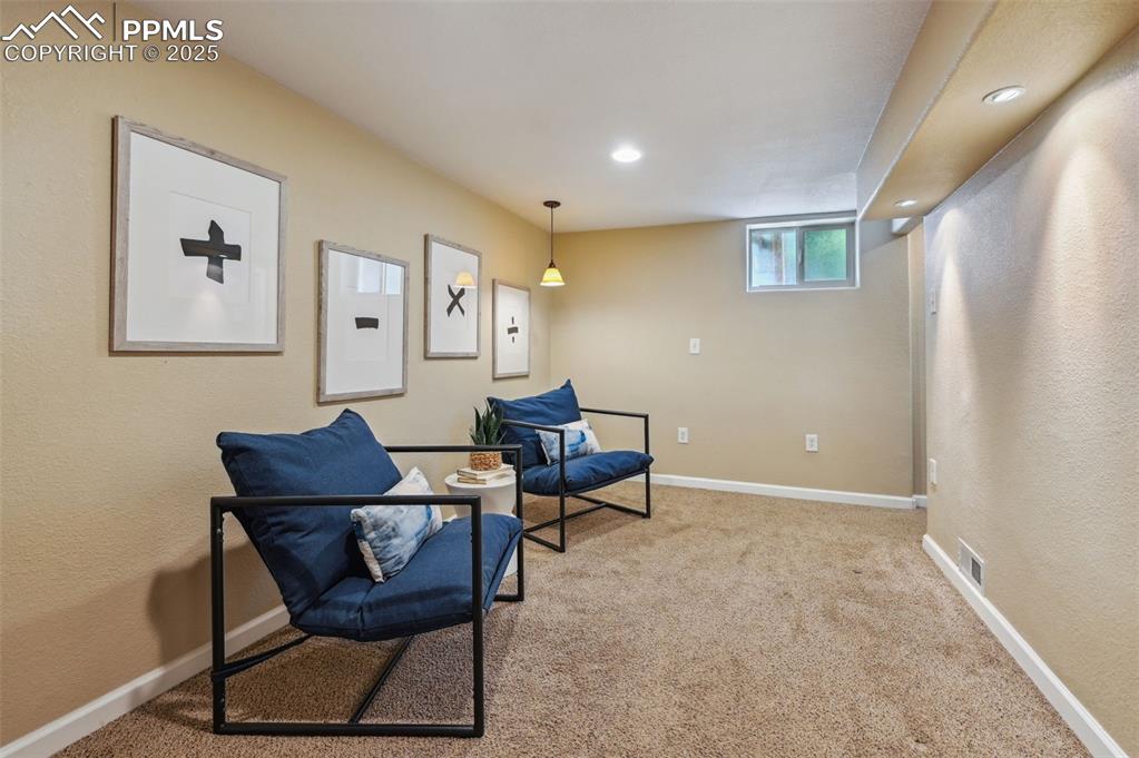 Image 18 of 31: Family room located in the basement