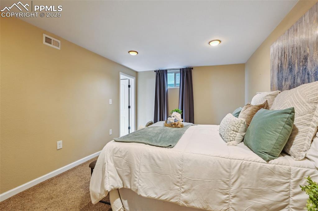 Image 21 of 31: Primary bedroom has a walk-in closet and adjoins to a bonus room.