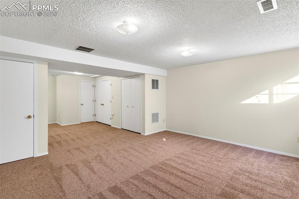 Image 14 of 17: New carpeting throughout the home.