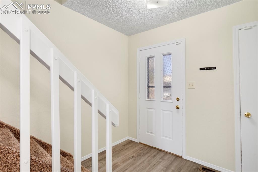 Image 2 of 17: The interior has fresh paint throughout