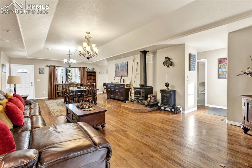 Image 10 of 30: Welcome to the openness of dining, living room, and kitchen