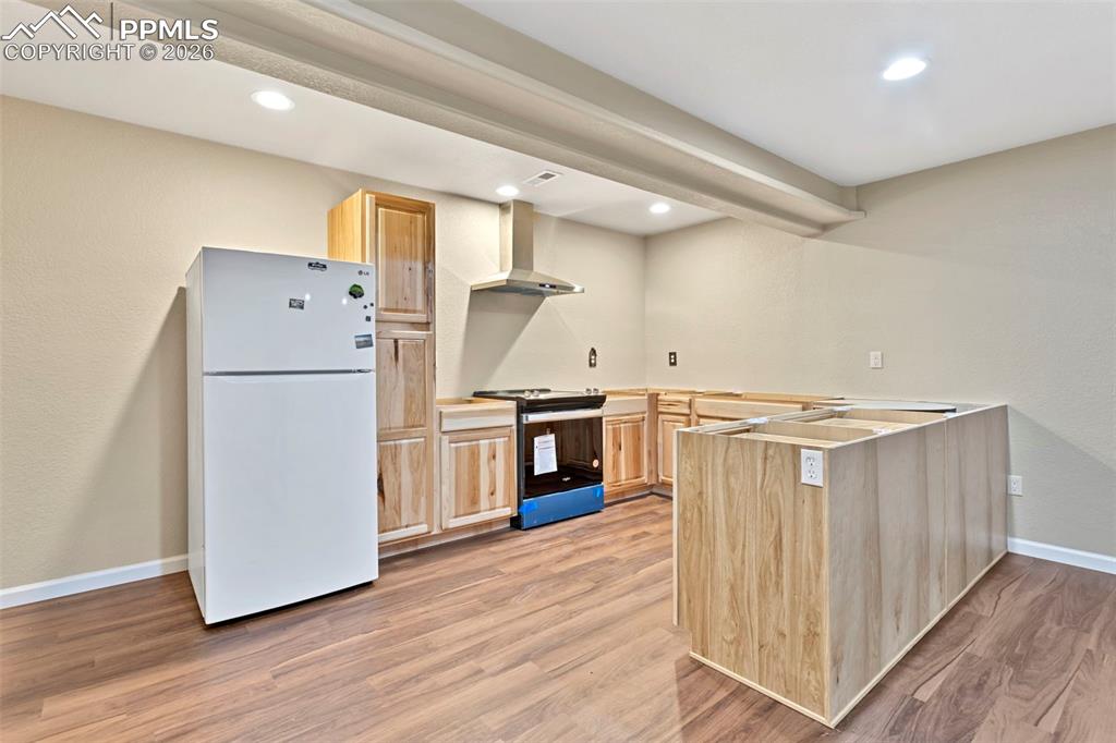 Image 23 of 30: Basement full kitchen
