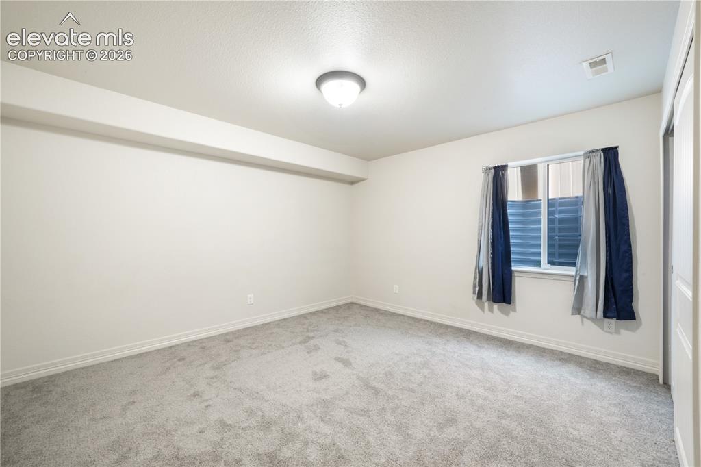 Image 34 of 50: Basement 3rd bedroom new carpet