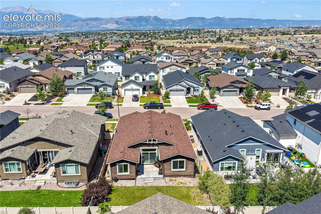 Image 4 of 50: Aerial view of backyard, views of Pikes Peak