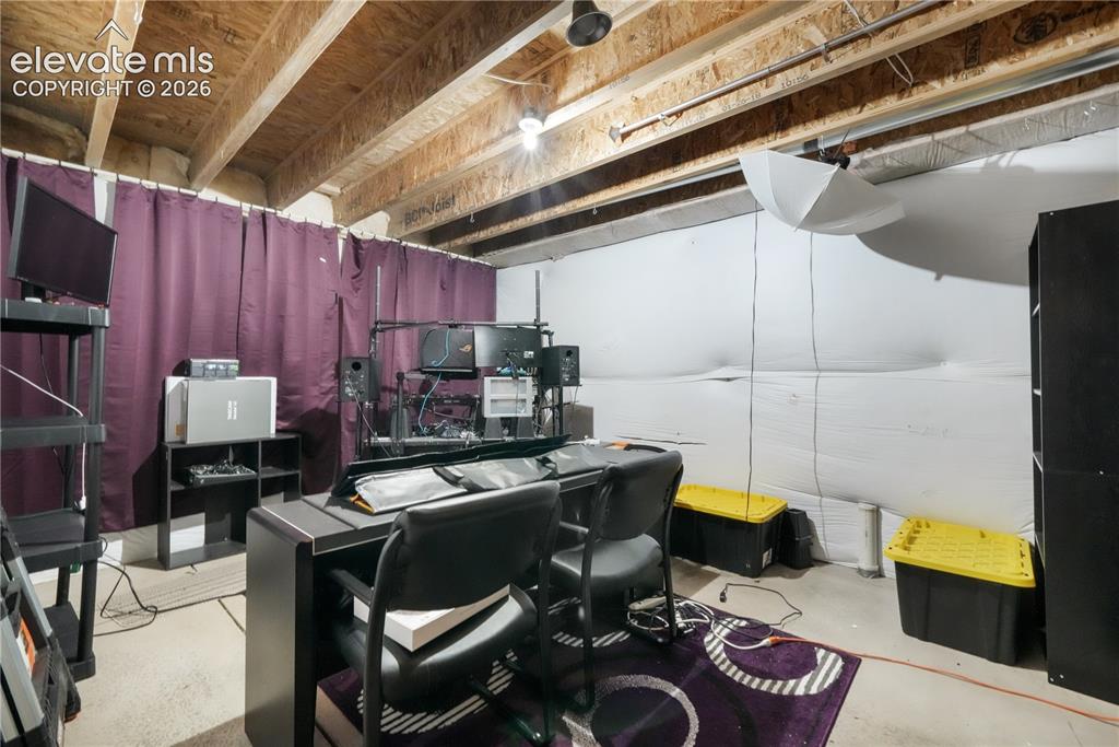 Image 41 of 50: Basement storage area, flex room - could be used for exercise equipment