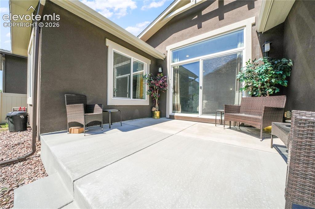 Image 45 of 50: Large patio with walk out access from living room