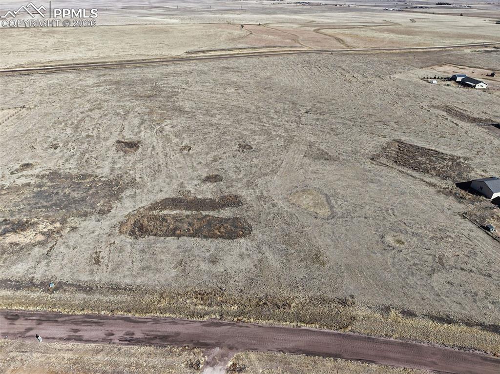 Image 8 of 17: Aerial Homesite View – Elevated perspective highlighting the level terrain 
