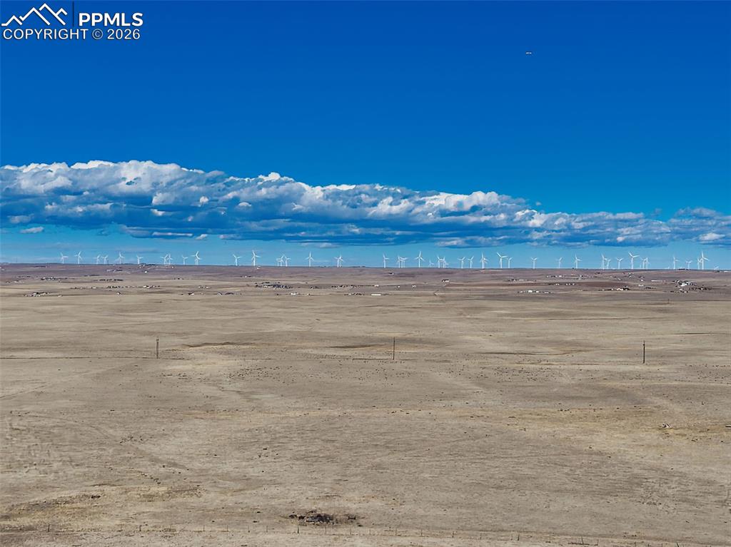 Image 9 of 17: Ground-Level Perspective – Expansive prairie landscape with sweeping sky vi