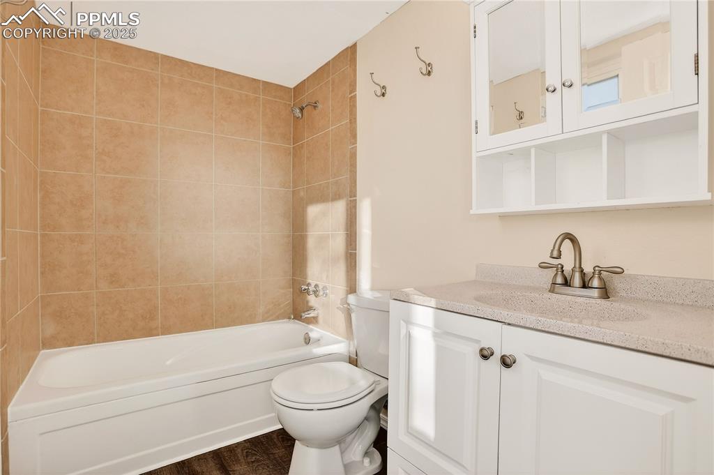 Image 17 of 42: Master bathroom includes built ins