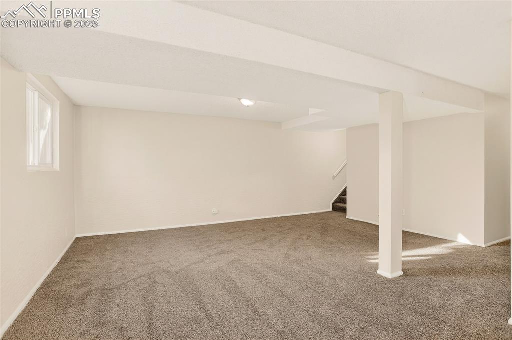 Image 23 of 42: Family room brings in natural light