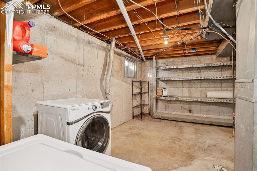 Image 29 of 42: Unfinished mechanical room comes with built ins for storage