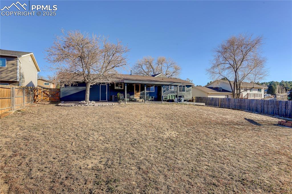 Image 37 of 42: Fully fenced backyard