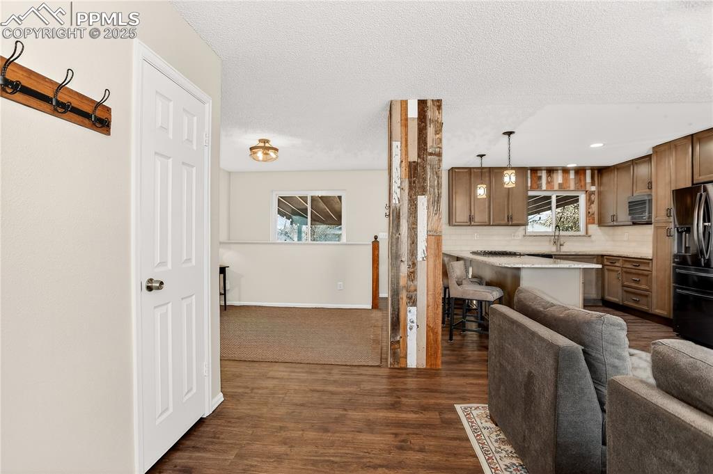 Image 6 of 42: Foyer view into home