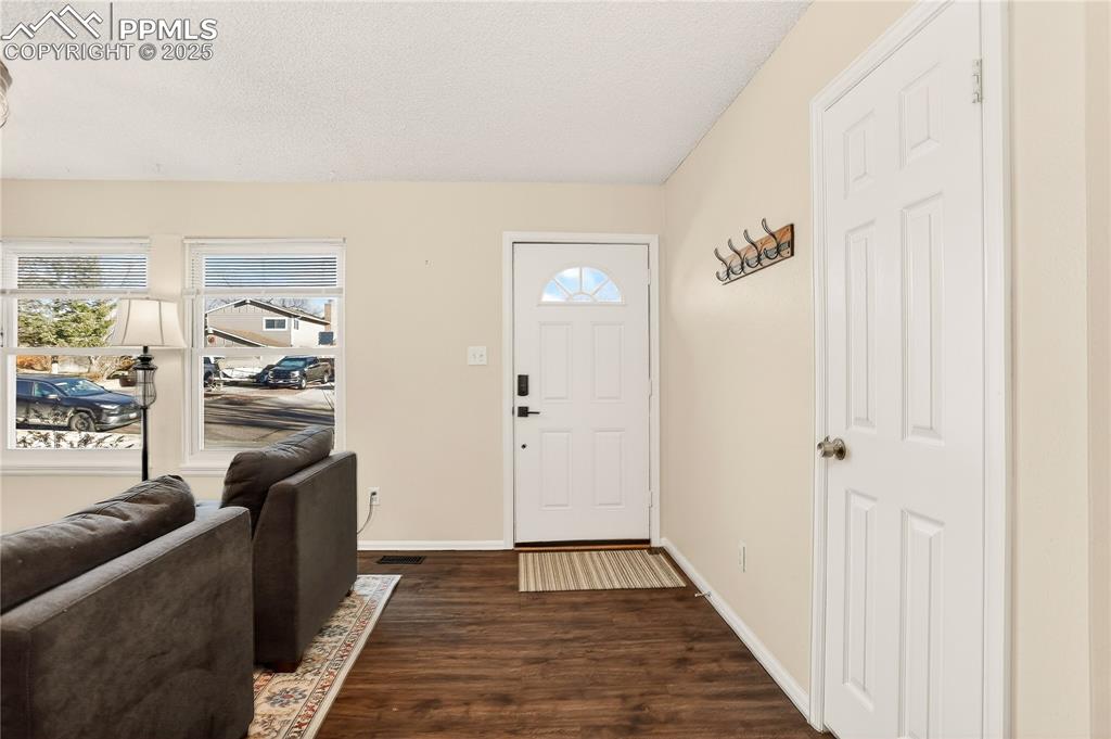 Image 7 of 42: Foyer entry LVT