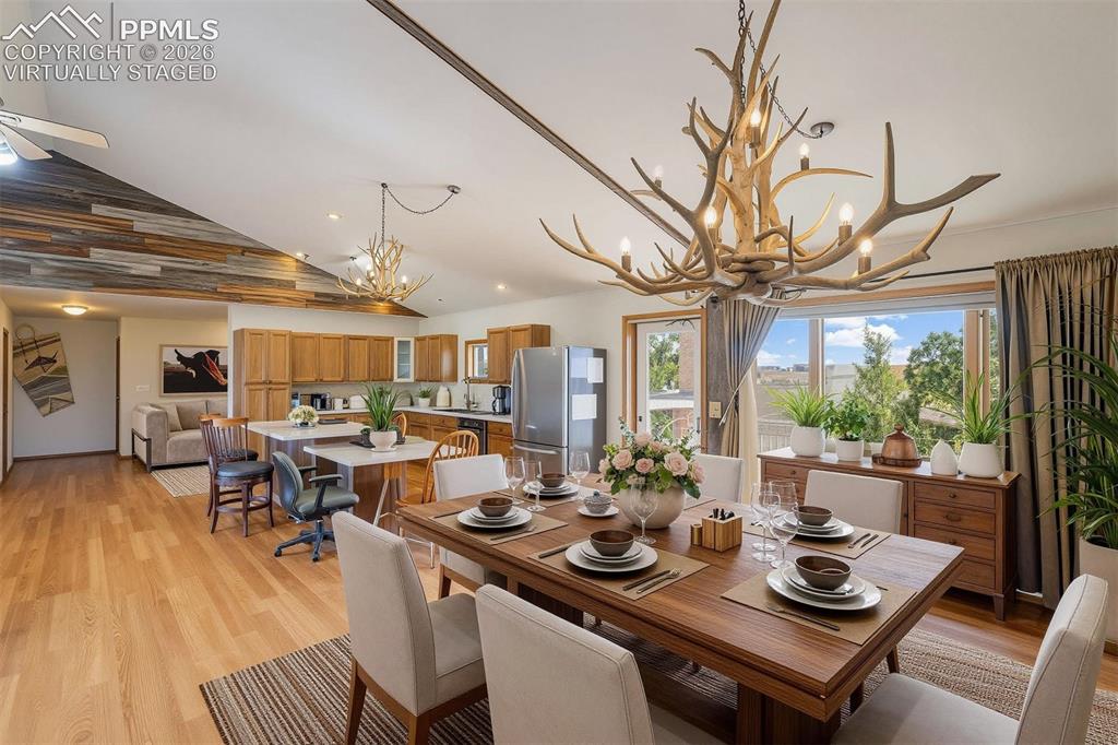 Image 31 of 50: virtually staged Open-concept living space featuring wood-finish flooring,