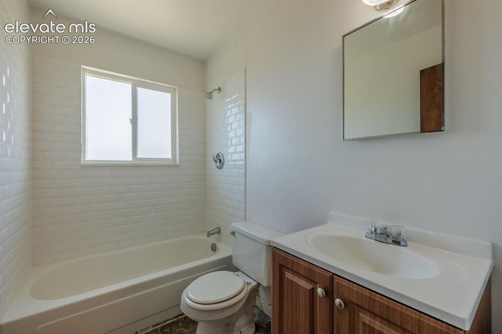 Image 15 of 26: Remodeled full bath