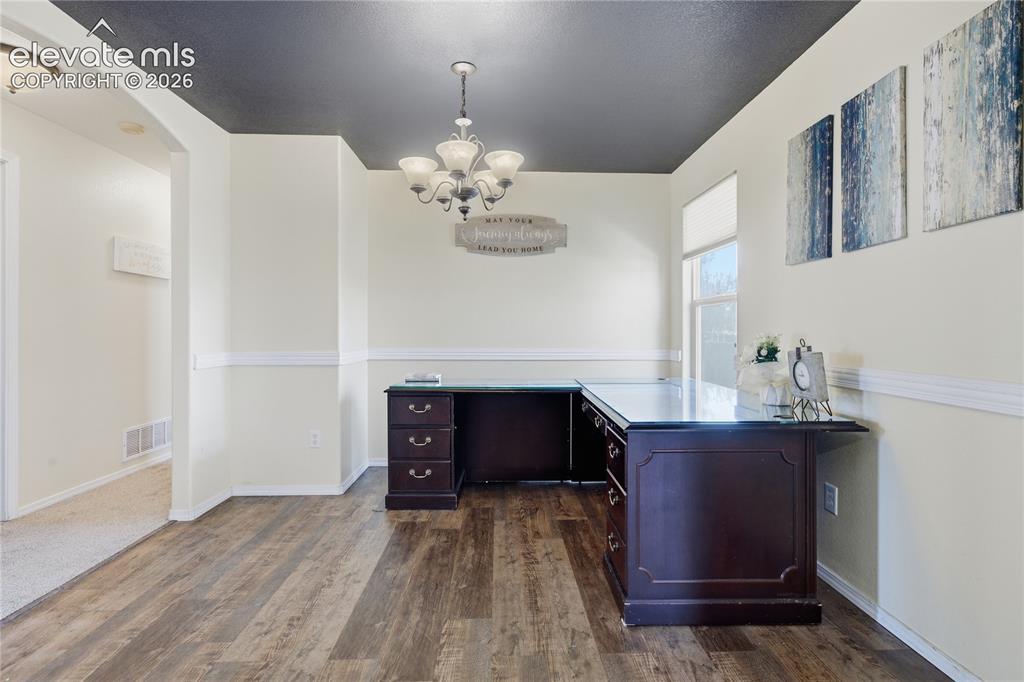 Image 10 of 31: FORMAL DINING ROOM OFF DINING AREA/KITCHEN