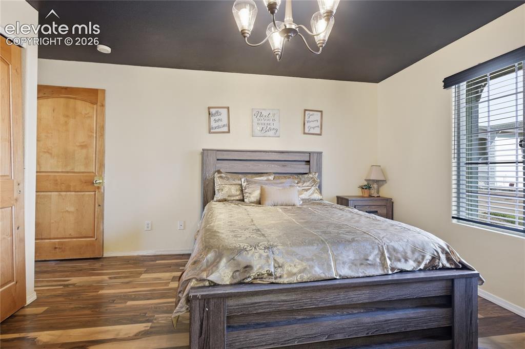 Image 12 of 31: PRIMARY SUITE INCLUDES AN ADJOINING BATH WITH DOUBLE SINKS, A LARGE SOAKING