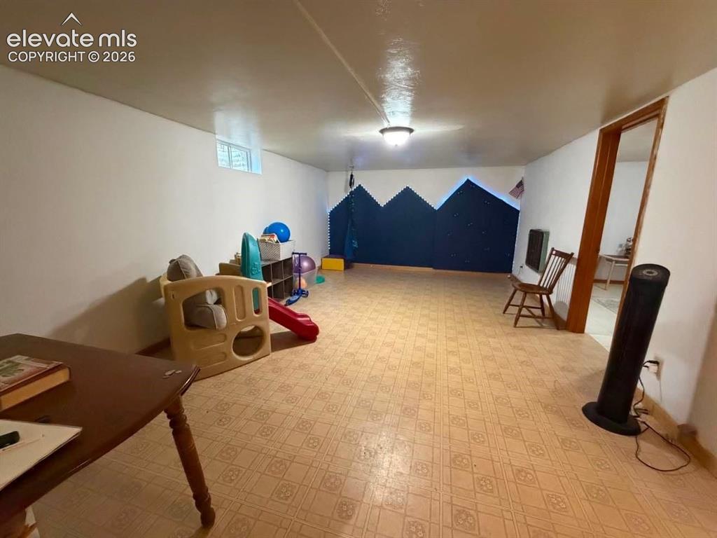 Image 16 of 21: Basement Rec Room
