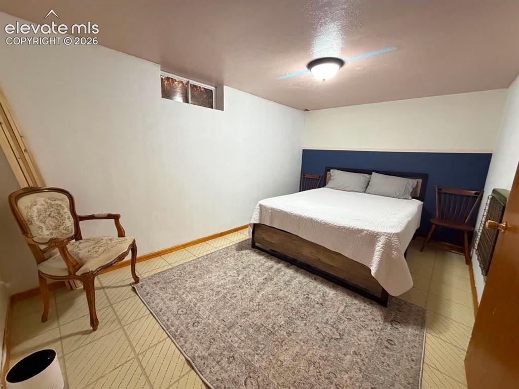 Image 17 of 21: Badement Bedroom