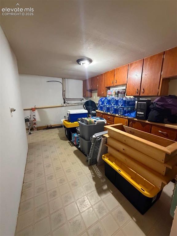 Image 20 of 21: Basement Storage Room