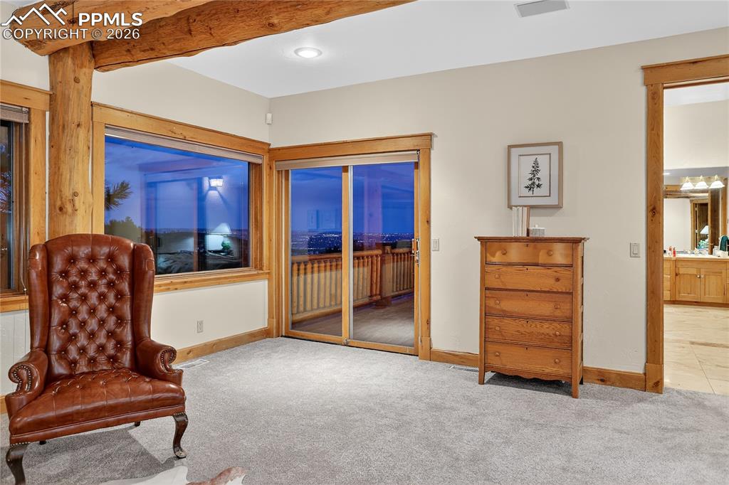 Image 23 of 47: Twinkling city lights visible from primary suite