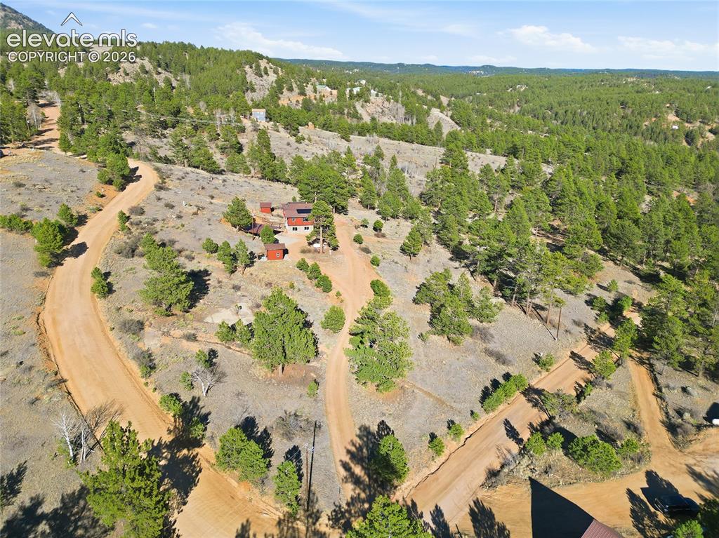 Image 2 of 49: Aerial view of the entire property area.