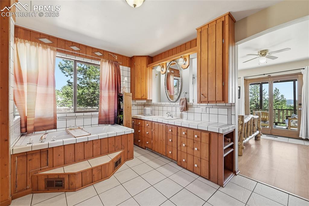 Image 21 of 49: Large ceramic counter top for morning preparations!