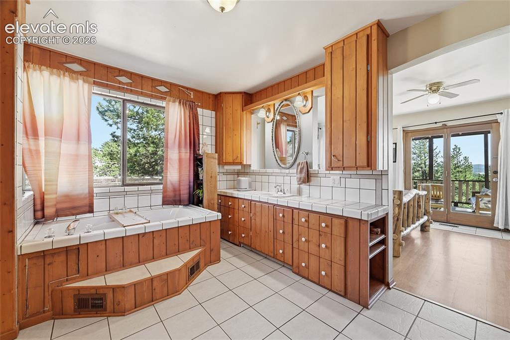 Image 24 of 49: Large ceramic counter top for morning preparations!