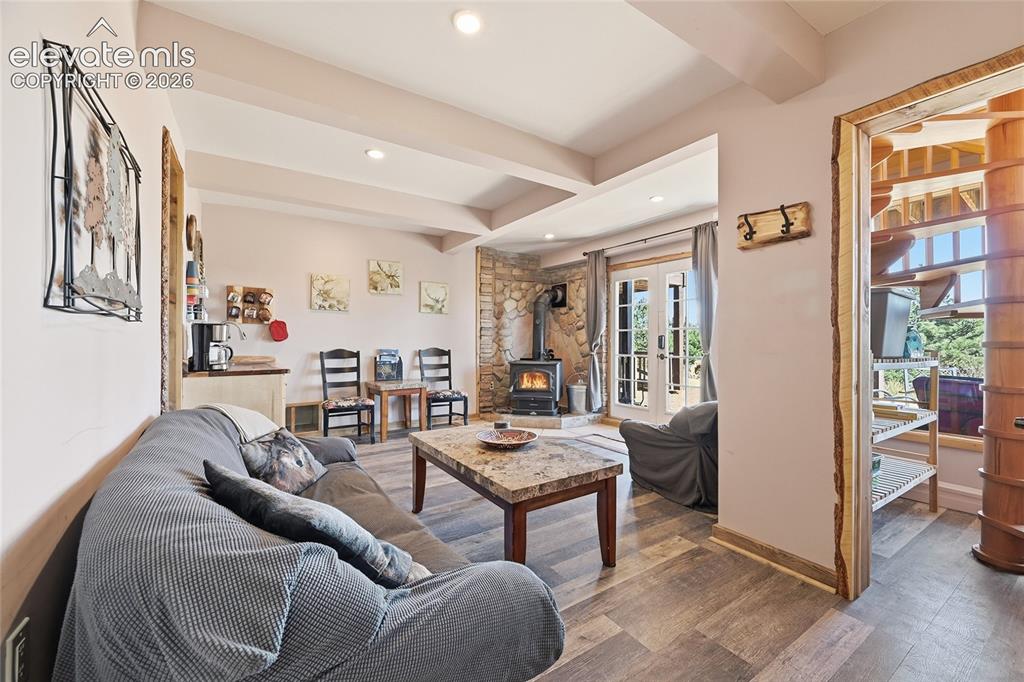 Image 27 of 49: Awesome cozy living room for additional family or guests. Furniture remains