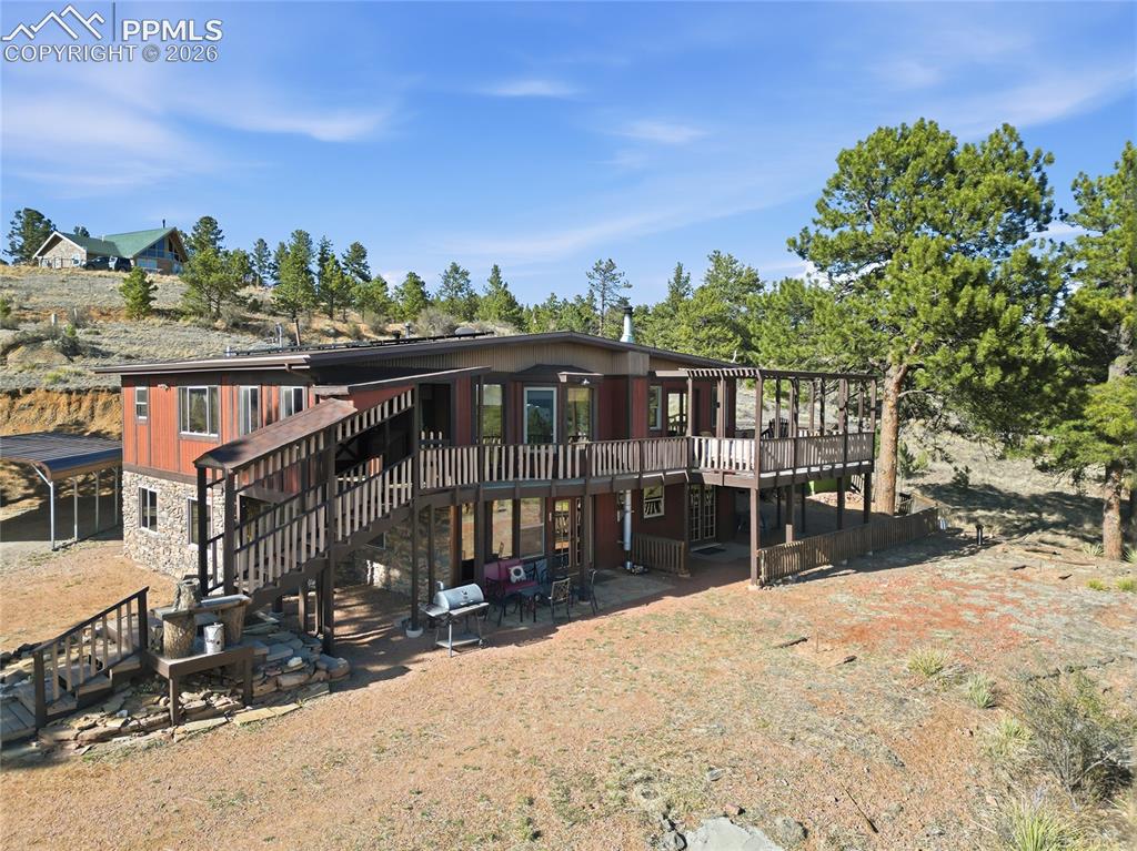 Image 45 of 49: Aerial view of the house from the south.