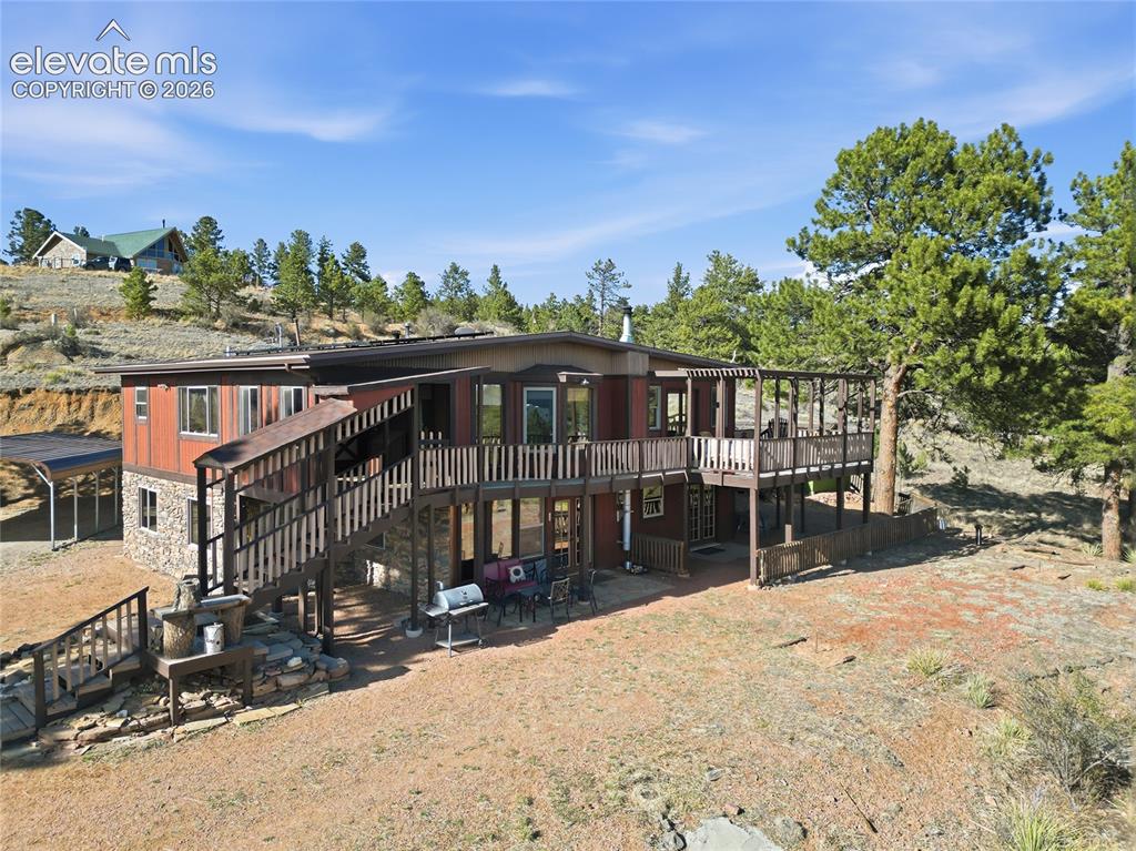 Image 46 of 49: Aerial view of the house from the south.