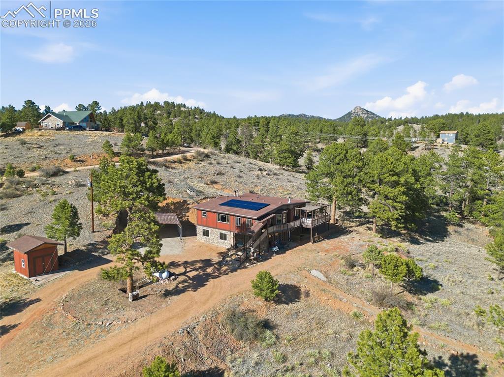 Image 47 of 49: Aerial view of the surrounding area taken from the south